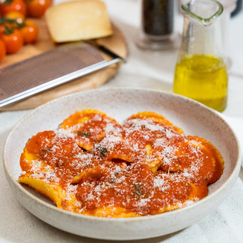 Ravioli Ricotta, Tomato sauce and Parmesan cheese