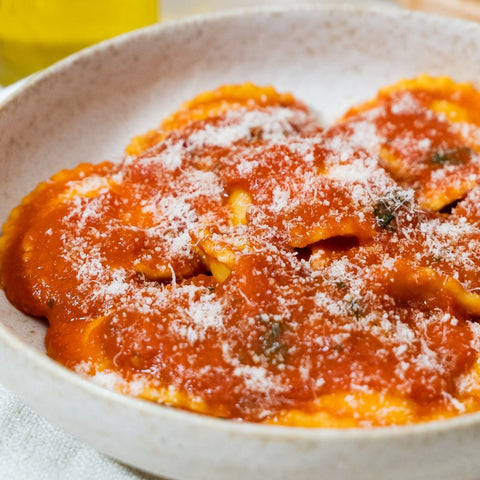 Ravioli Ricotta, Tomato sauce and Parmesan cheese