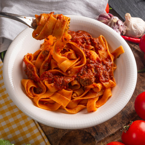 Bolognese-style (Ragu) Tagliatelle and Parmesan Cheese